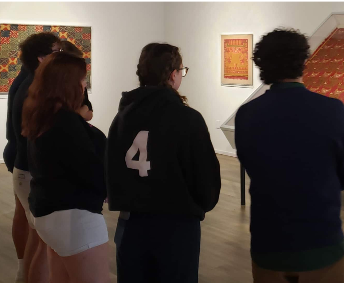 Students looking at art at Stevens Art Gallery