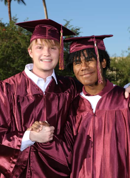 Students in graduation caps and gowns