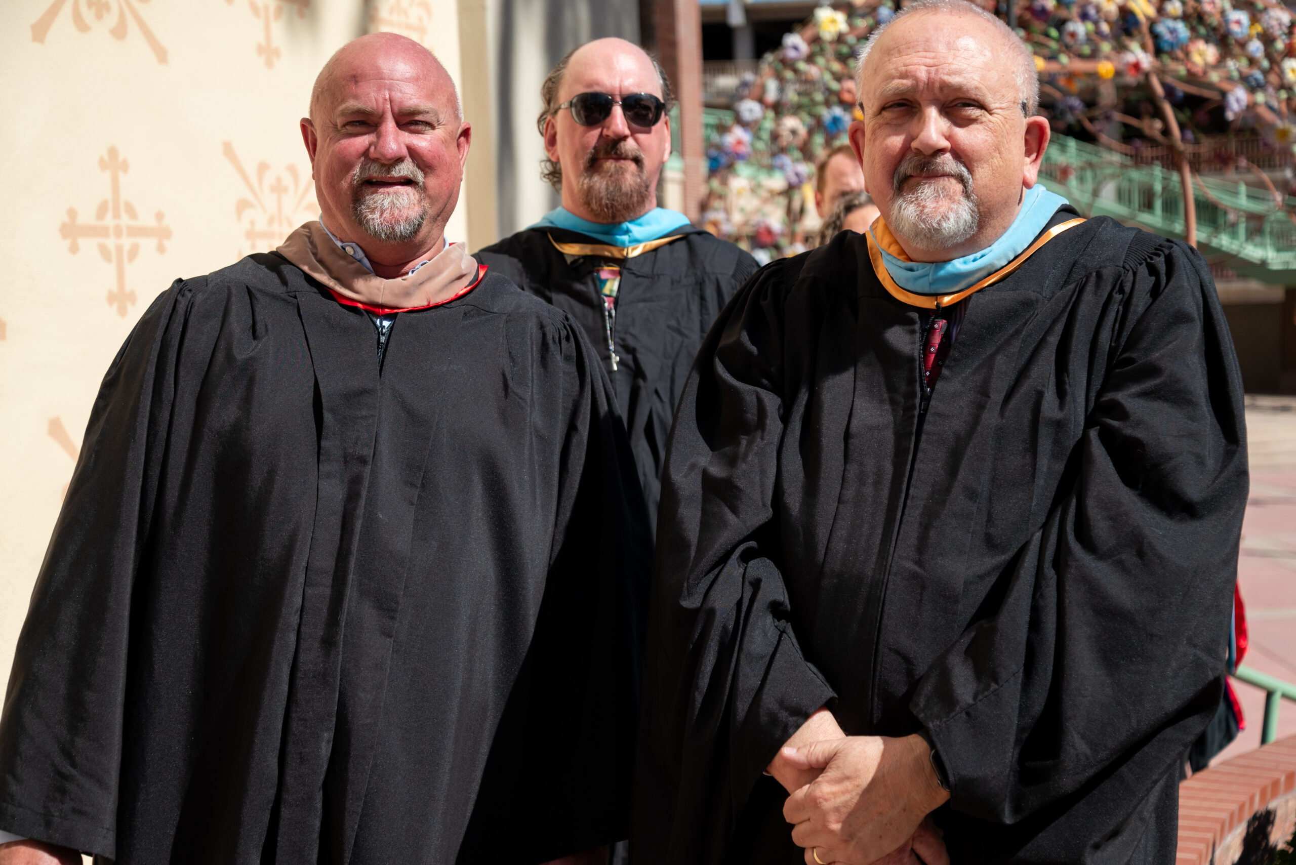 Faculty in graduation gowns