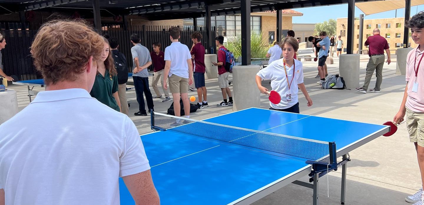 Students playing ping pong