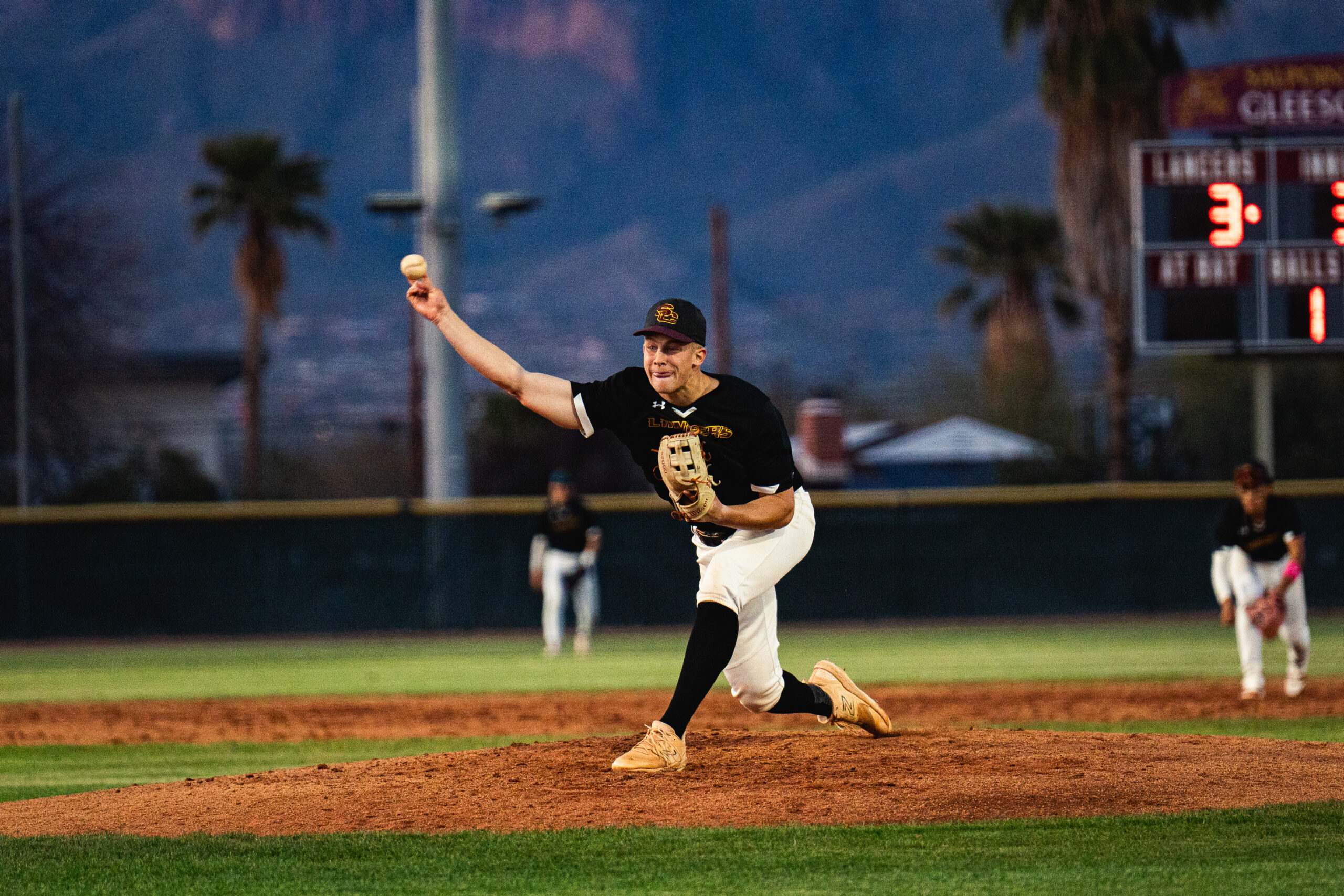 Male playing baseball