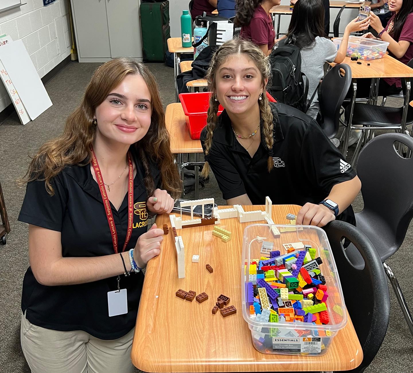 Students playing with legos